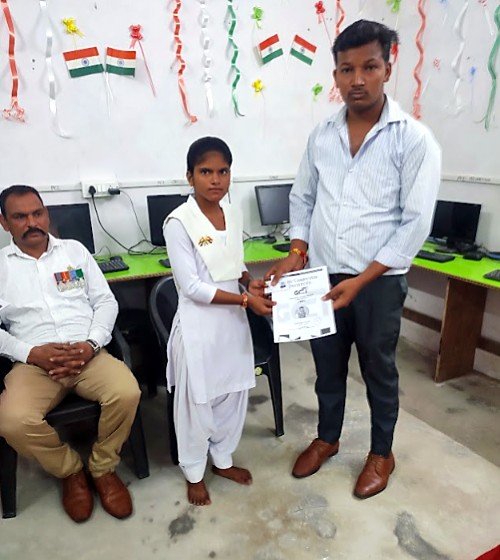 Students receiving their course certificates